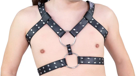 A black leather chest harness with narrow straps