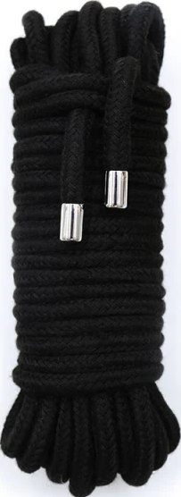 A bundled length of black cotton bondage rope.