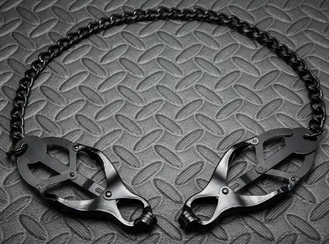 A pair of clover nipple clamps